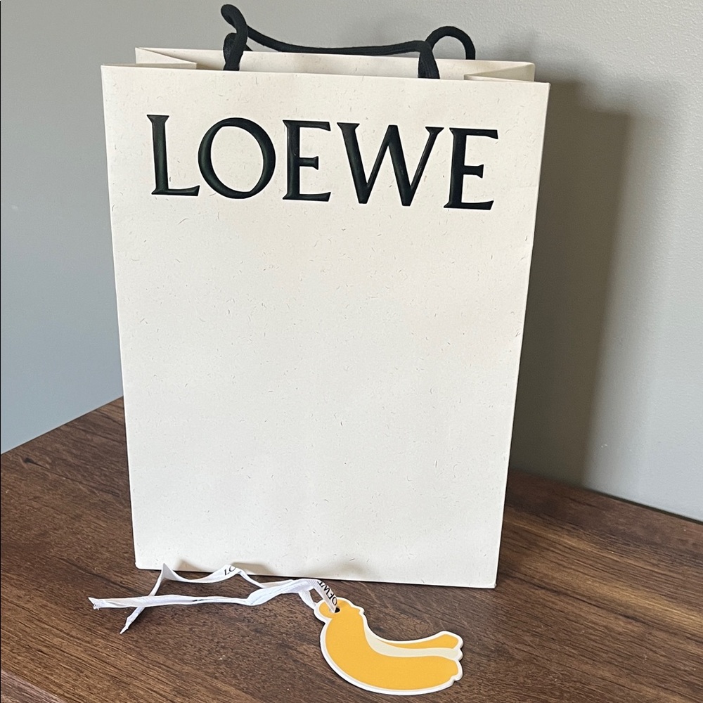 Loewe Cream Paper Gift Bag with Black Logo and Yellow Tag
